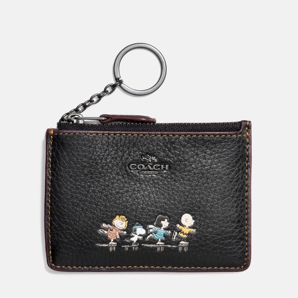 Coach Handbags - 🔥🌟RARE NWTs Coach x Peanuts Boxed Mini Skinny ID